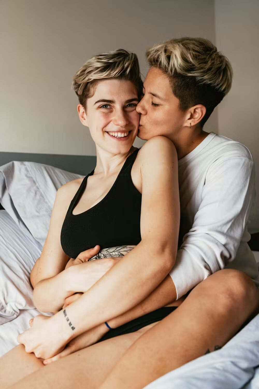 Bellevue transgender BBL model hugging their partner